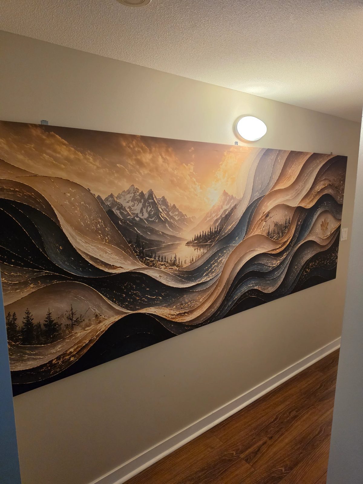 Customer photo — large canvas artwork mounted in a hallway
